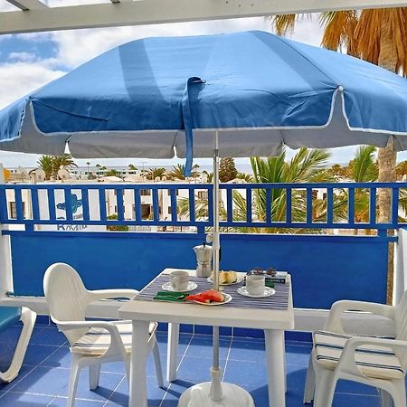 Aguazul - A Pie De Piscina Y Vistas Al Mar Apartman Puerto del Carmen  Kültér fotó