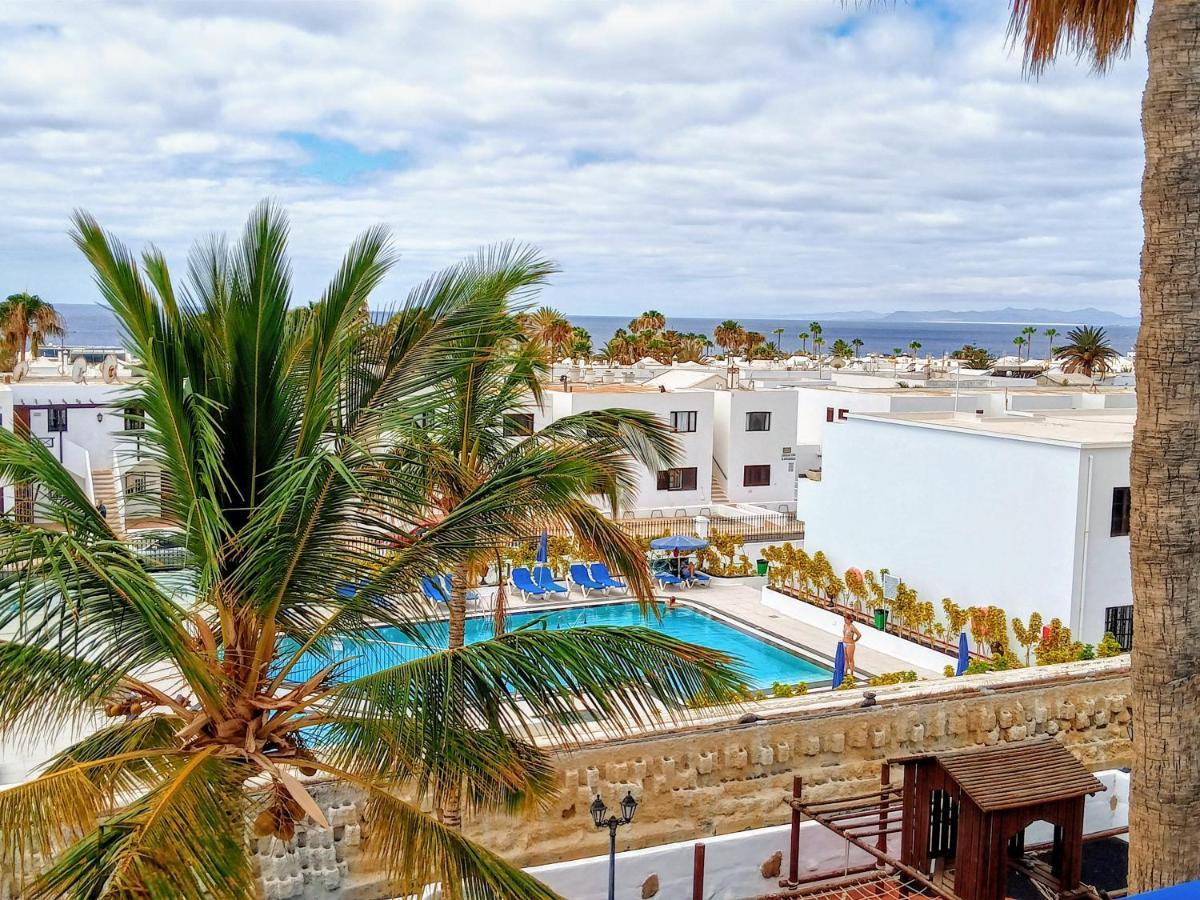 Aguazul - A Pie De Piscina Y Vistas Al Mar Apartman Puerto del Carmen  Kültér fotó