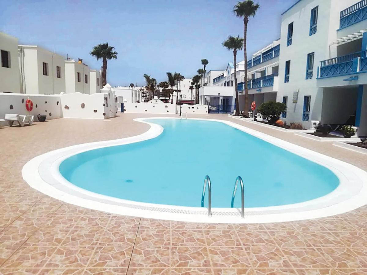 Aguazul - A Pie De Piscina Y Vistas Al Mar Apartman Puerto del Carmen  Kültér fotó