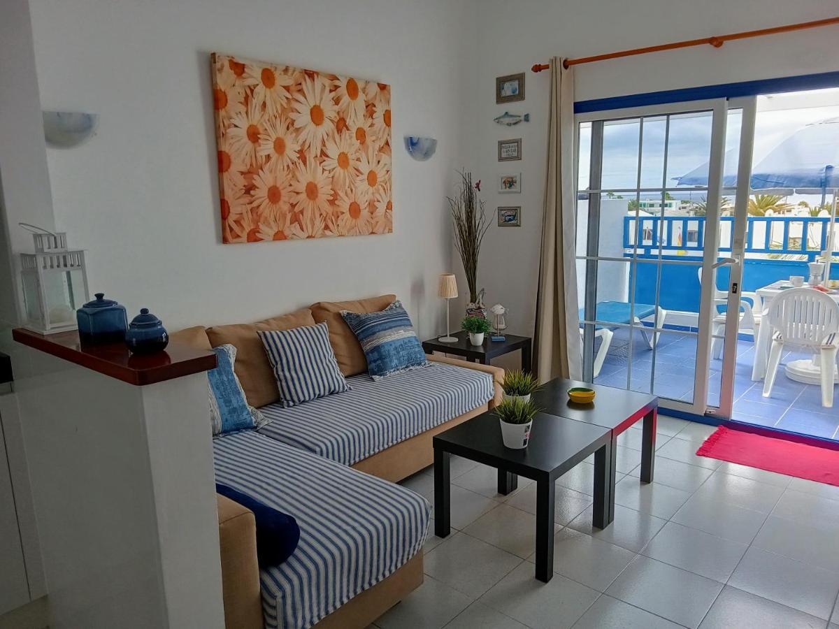 Aguazul - A Pie De Piscina Y Vistas Al Mar Apartman Puerto del Carmen  Kültér fotó